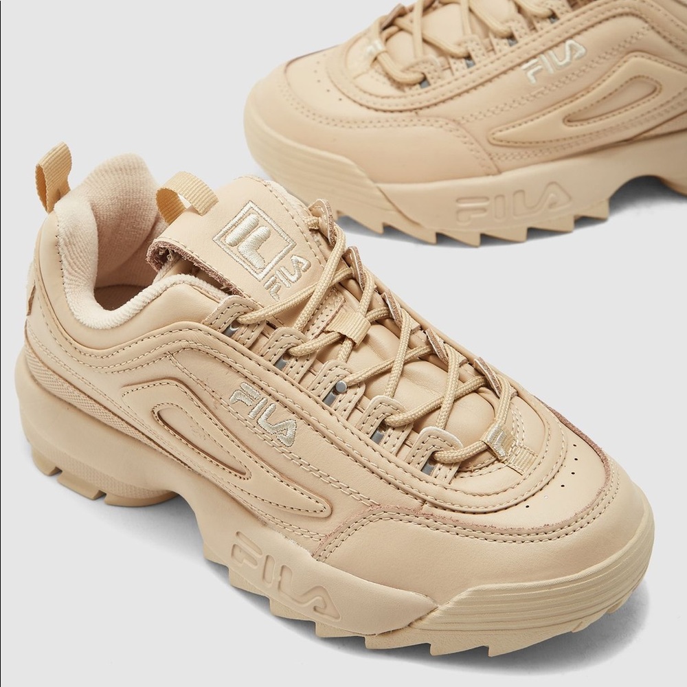 Beige Fila Disruptors